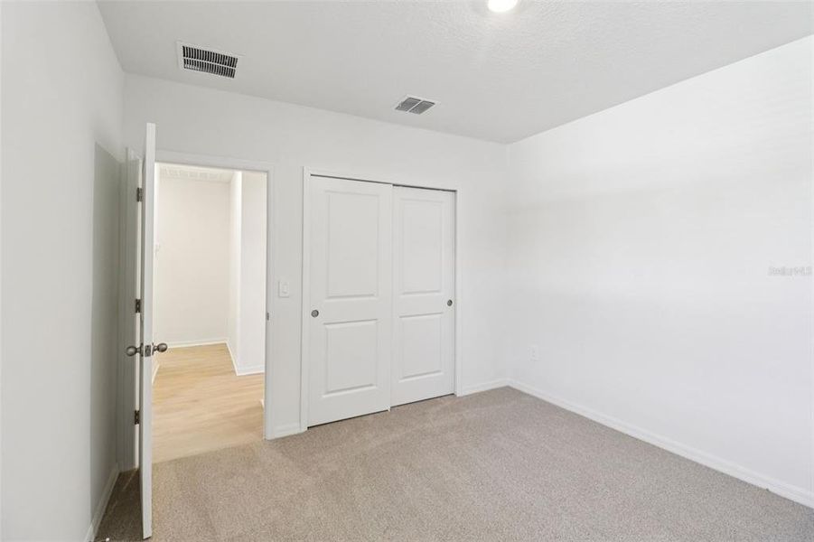 Spacious, unfurnished interior of a new home in Ridgehaven - Villas, Ormond Beach (Image 19).