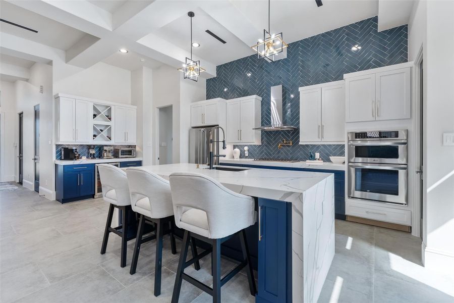Model home view of kitchen with quartz countertop. Model home view of kitchen with quartz countertop.