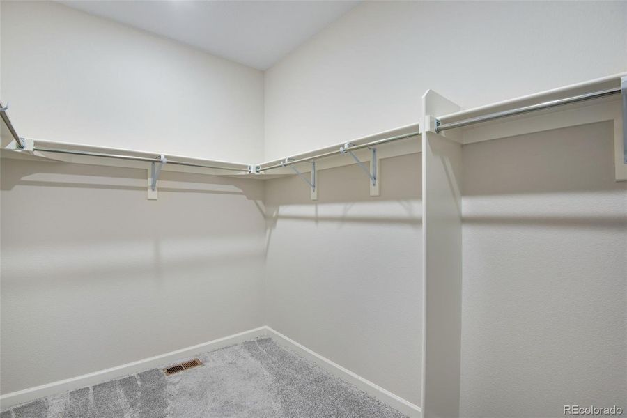 Spacious, unfurnished interior of a new home in Ensemble at The Aurora Highlands, Aurora (Image 24).