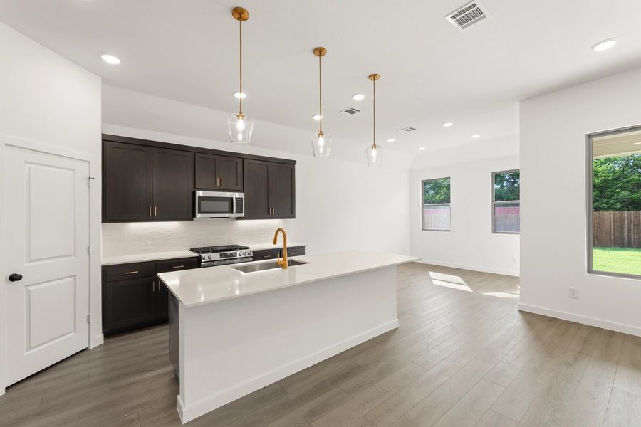 Open Kitchen-Dining Room Representative Photo featuring the Oxford Collection Open Kitchen-Dining Room Representative Photo featuring the Oxford Collection
