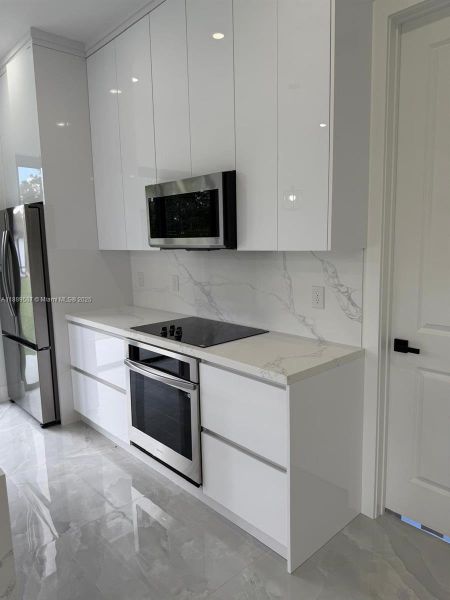 Furnished interior view inside a new home in , Lehigh Acres (Image 6).