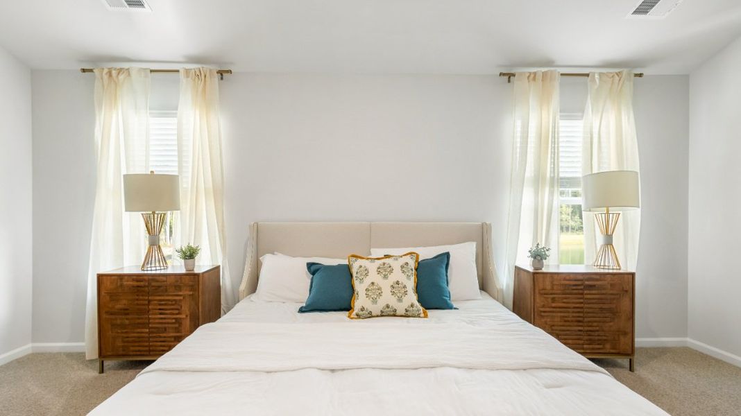 Furnished interior view inside a new home in The Towns at Blue Jay, Rincon (Image 17).