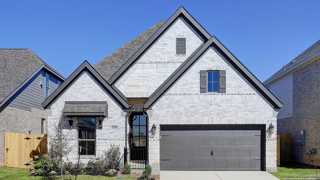 Front exterior of a new home in Kallison Ranch, San Antonio, TX, highlighting curb appeal (Image 2). Front exterior of a new home in Kallison Ranch, San Antonio, TX, highlighting curb appeal (Image 2).