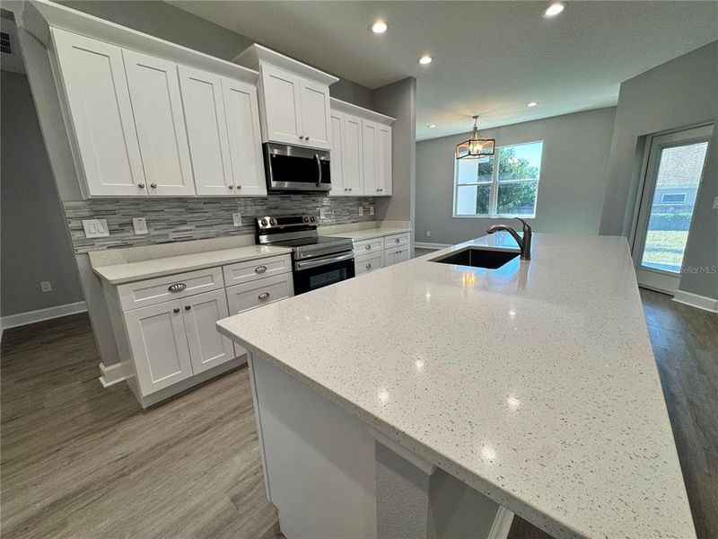 Furnished interior view inside a new home in , Dade City (Image 9).