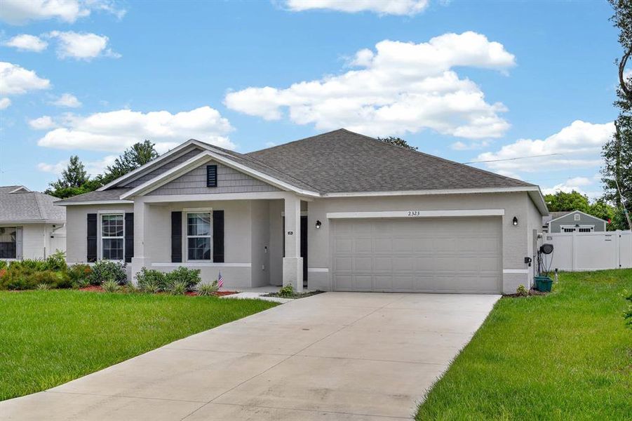 Front exterior of a new home in , Edgewater, FL, highlighting curb appeal (Image 20). Front exterior of a new home in , Edgewater, FL, highlighting curb appeal (Image 20).
