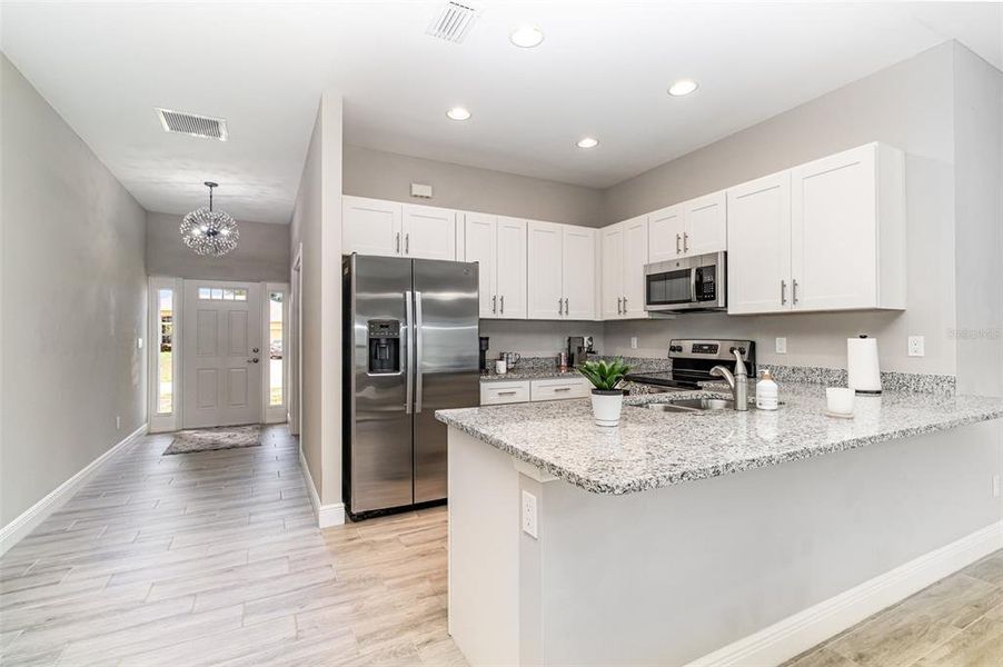 Furnished interior view inside a new home in , Cape Coral (Image 22).