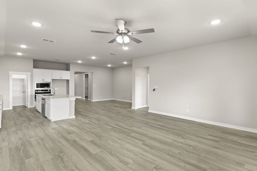 Representative unfurnished interior of a home built from the Hickory Sunterra 50s by Brohn Homes in Sunterra, Katy (Image 12).