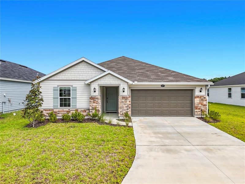 Front exterior of a new home in , Jacksonville, FL, highlighting curb appeal (Image 25).