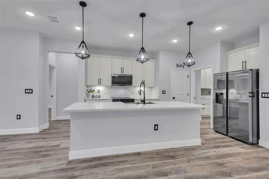 Furnished interior view inside a new home in , Kissimmee (Image 12).
