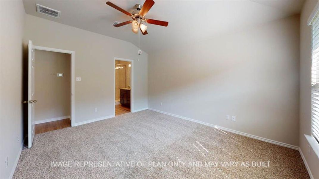 Unfurnished bedroom with carpet, lofted ceiling, baseboards, multiple windows, and ensuite bathroom Unfurnished bedroom with carpet, lofted ceiling, baseboards, multiple windows, and ensuite bathroom