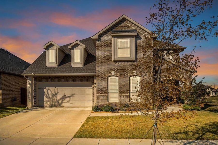 Front exterior of a new home in Country Lakes Classic 50, Denton, TX, highlighting curb appeal (Image 20). Front exterior of a new home in Country Lakes Classic 50, Denton, TX, highlighting curb appeal (Image 20).