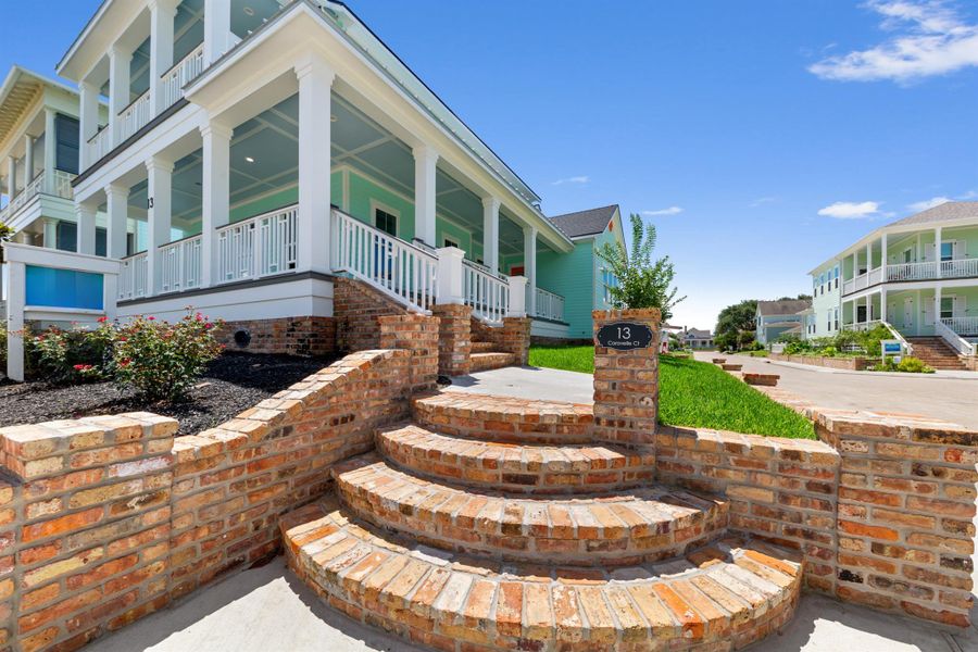 Front exterior of a new home in , Galveston, TX, highlighting curb appeal (Image 23).