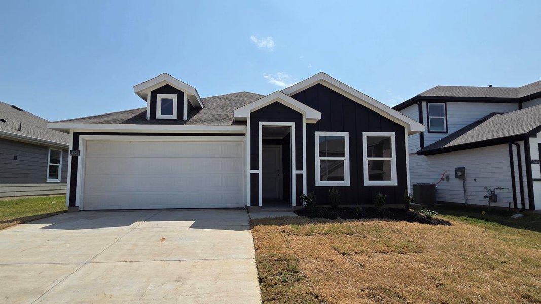 Front exterior of a new home in Lonestar at Liberty Trails, Fort Worth, TX, highlighting curb appeal (Image 1). Front exterior of a new home in Lonestar at Liberty Trails, Fort Worth, TX, highlighting curb appeal (Image 1).