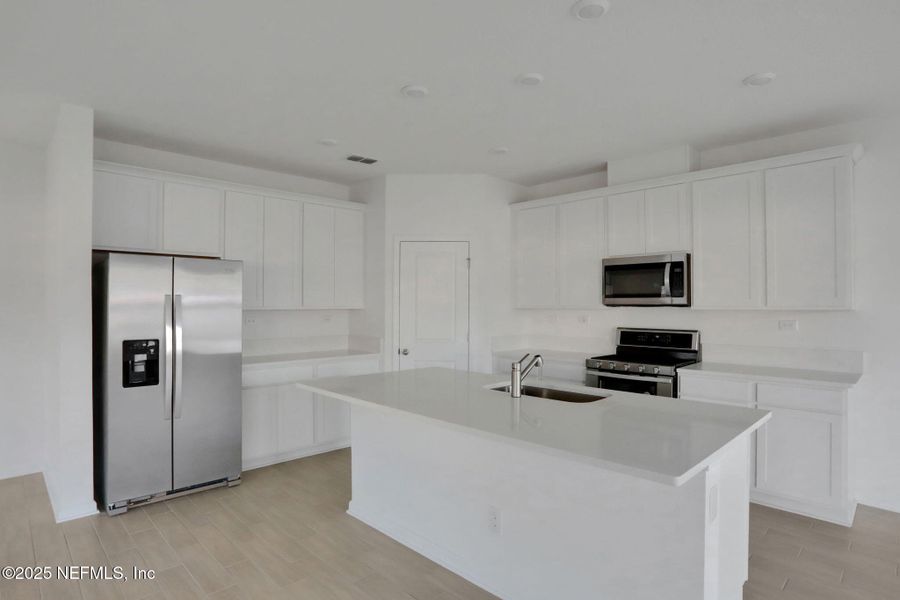 Furnished interior view inside a new home in Cordova Palms, St. Augustine (Image 8).