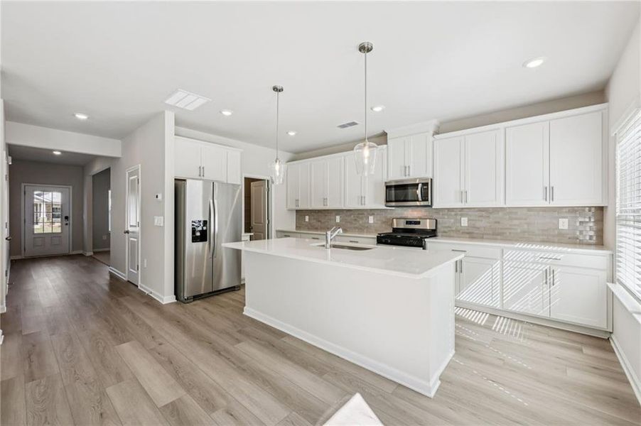 Furnished interior view inside a new home in Parkside at Grayson, Grayson (Image 7).