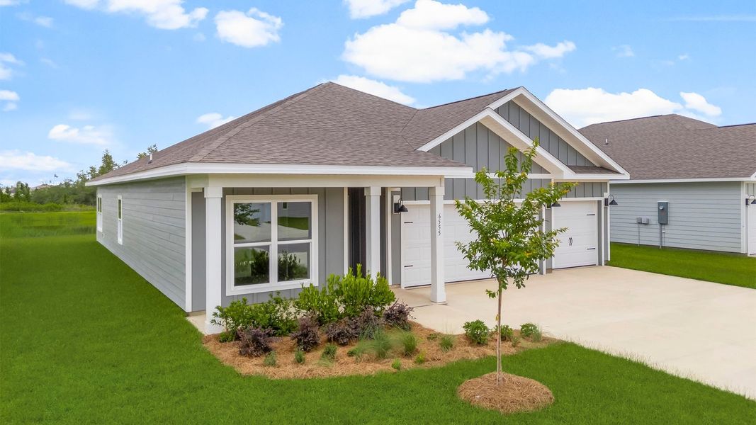 Front exterior of a new home in Destini Lane, Panama City, FL, highlighting curb appeal (Image 24).