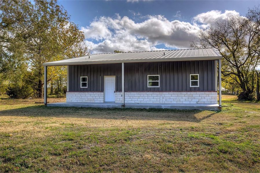 Exterior details and patio area of a home in , Point (Image 23).