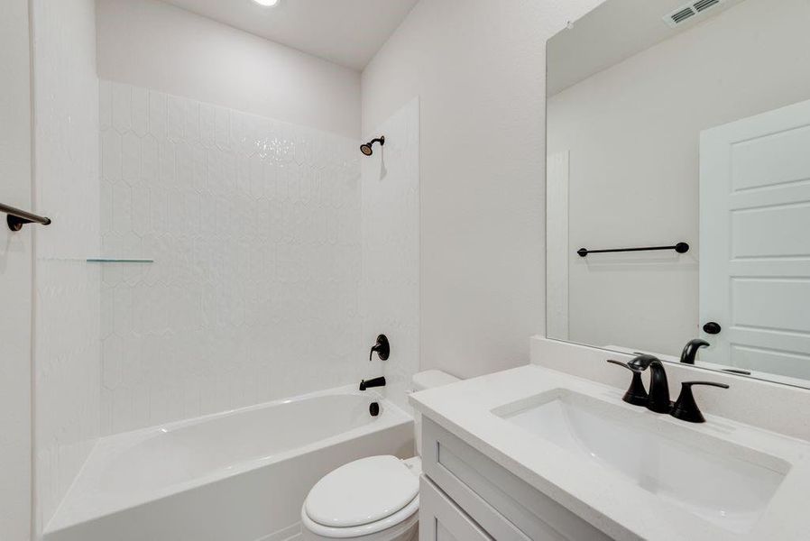 Furnished interior view inside a new home in Villages of Creekwood, Frisco (Image 12).