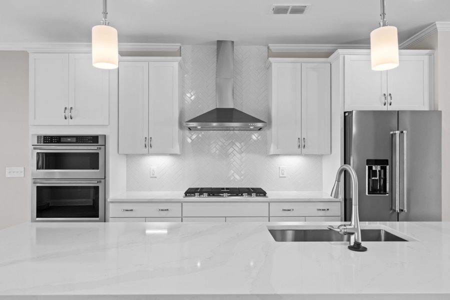 Furnished interior view inside a new home in Lakeside Townes at Riverlights, Wilmington (Image 9).