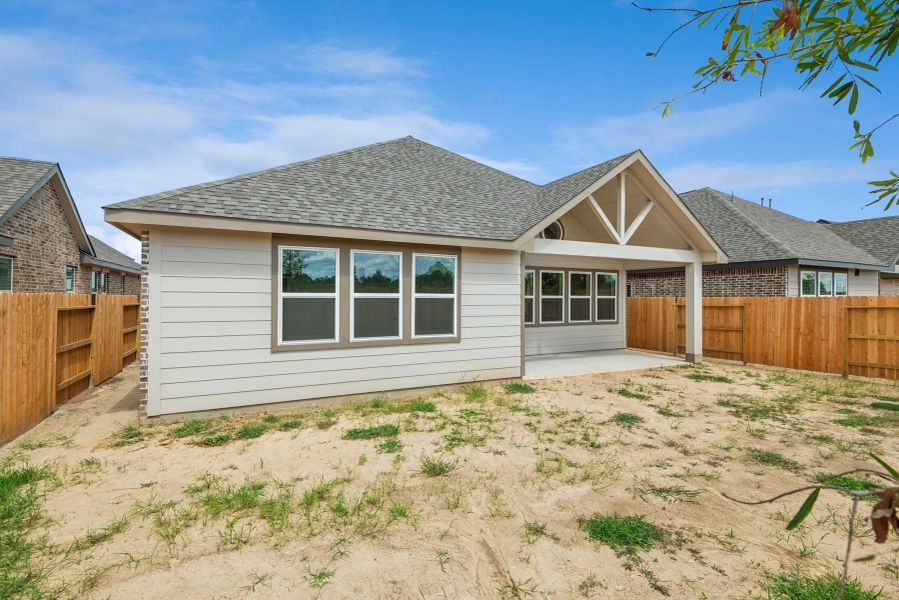 Exterior details and patio area of a home in Harvest Pointe, Needville (Image 19).