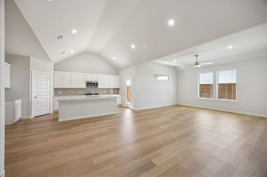 Open Floor Plan in the Wimbledon home plan by Trophy Signature Homes – REPRESENTATIVE PHOTO Open Floor Plan in the Wimbledon home plan by Trophy Signature Homes – REPRESENTATIVE PHOTO