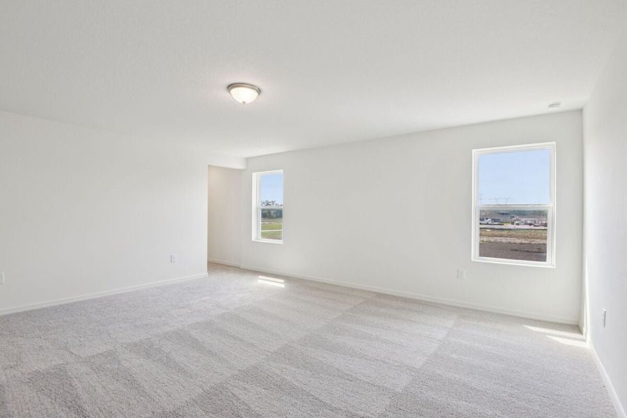 Spacious, unfurnished interior of a new home in The Preserve at Legends Pointe II, Hudson (Image 8).