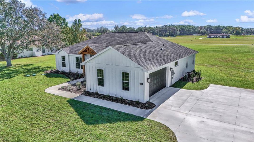 Exterior details and patio area of a home in , Ocala (Image 24).
