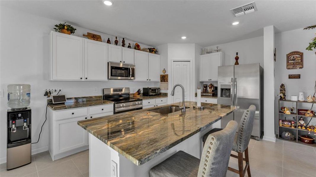 Furnished interior view inside a new home in Peace Creek Reserve, Winter Haven (Image 9).