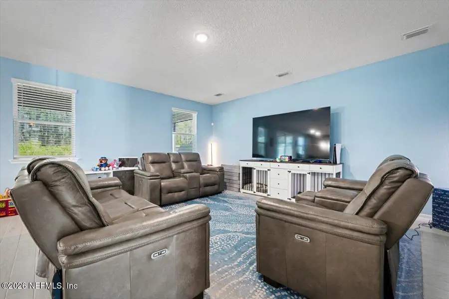 Furnished interior view inside a new home in RiverTown - Settlement, St. Johns (Image 11).