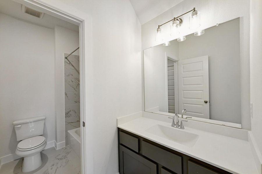 Furnished interior view inside a new home in Santa Rita Ranch - 60', Liberty Hill (Image 13).