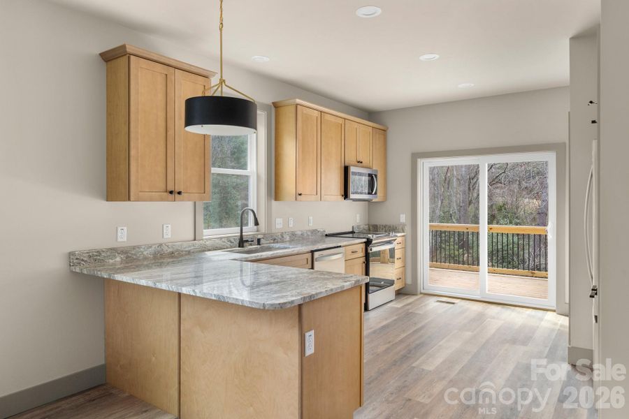Furnished interior view inside a new home in , Asheville (Image 4).