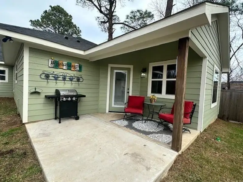 Exterior details and patio area of a home in , Denison (Image 3).