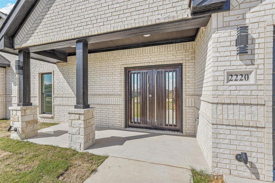 Doorway to property featuring french doors