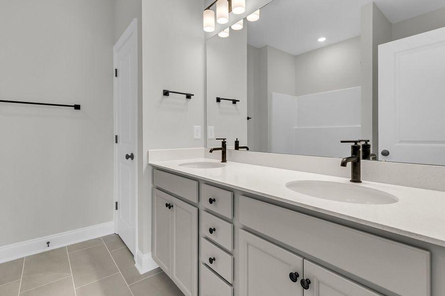 Furnished interior view inside a new home in Tidewater at Lakes of Cane Bay, Summerville (Image 16).