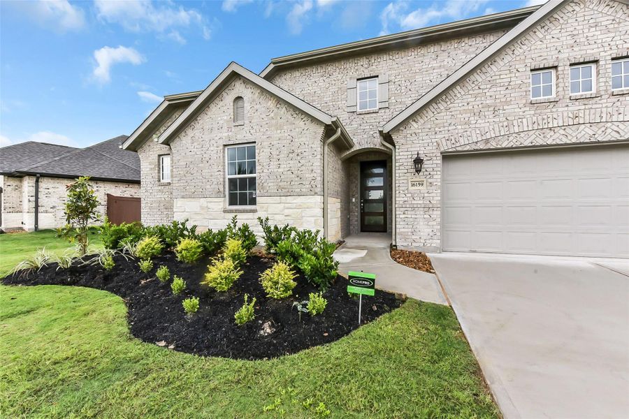 Exterior details and patio area of a home in Evergreen 55', Conroe (Image 29).