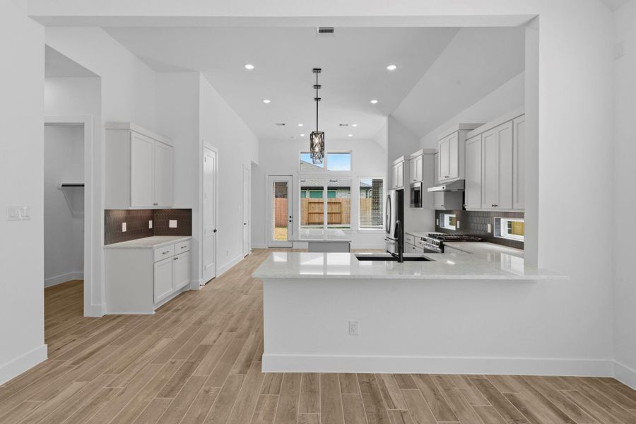 Furnished interior view inside a new home in Wood Leaf Reserve, Tomball (Image 5).