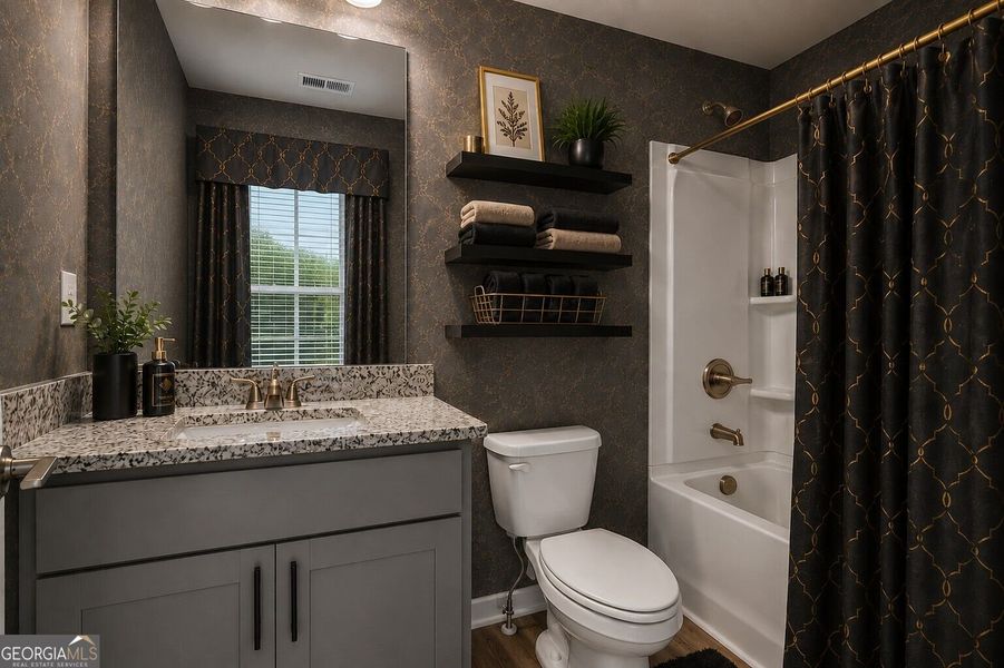 Furnished interior view inside a new home in The Fairways at Mirror Lake, Villa Rica (Image 36).