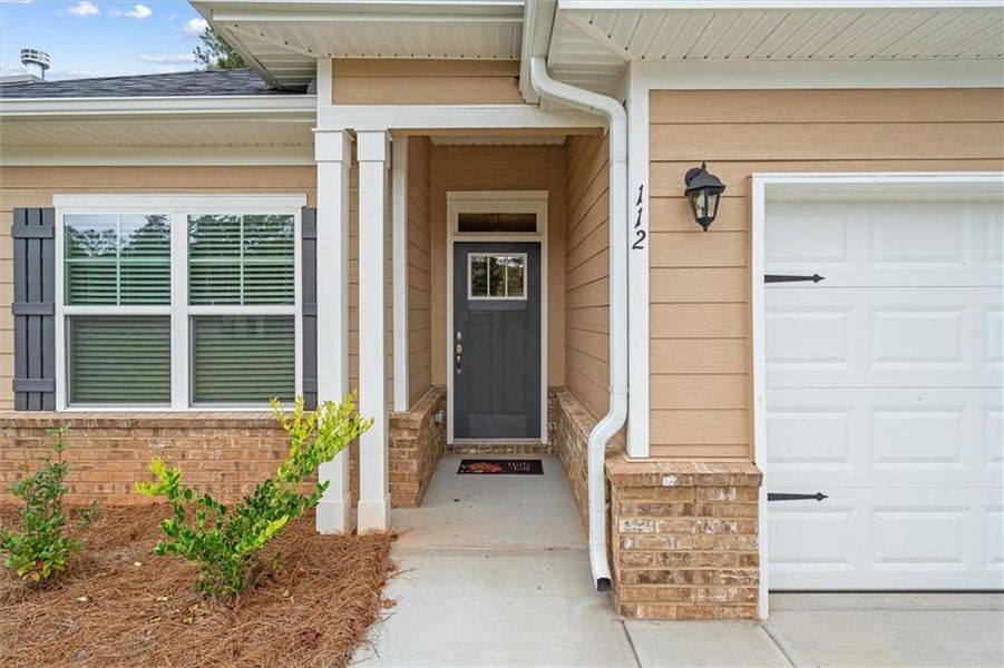 Exterior details and patio area of a home in Canterbury Villas, Carrollton (Image 19).