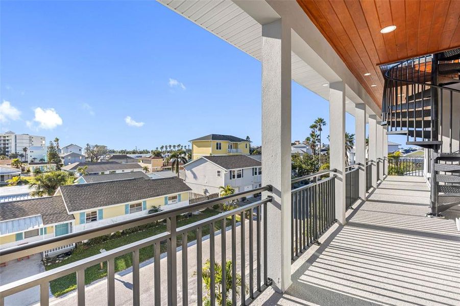 expansive balcony with exterior lighting