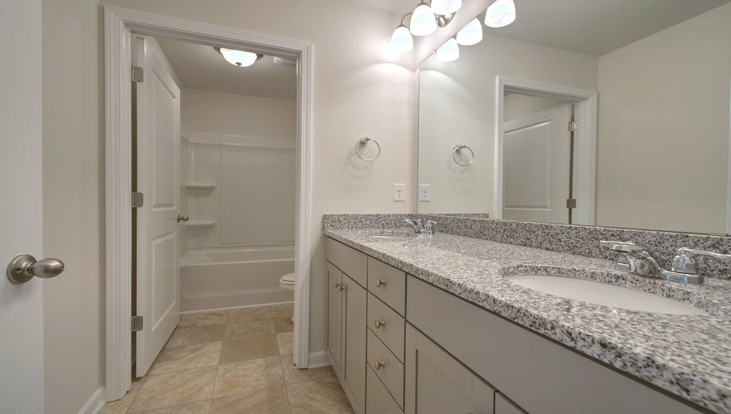Furnished interior view inside a new home in Reserve at Tap Root Farms, Fletcher (Image 13).