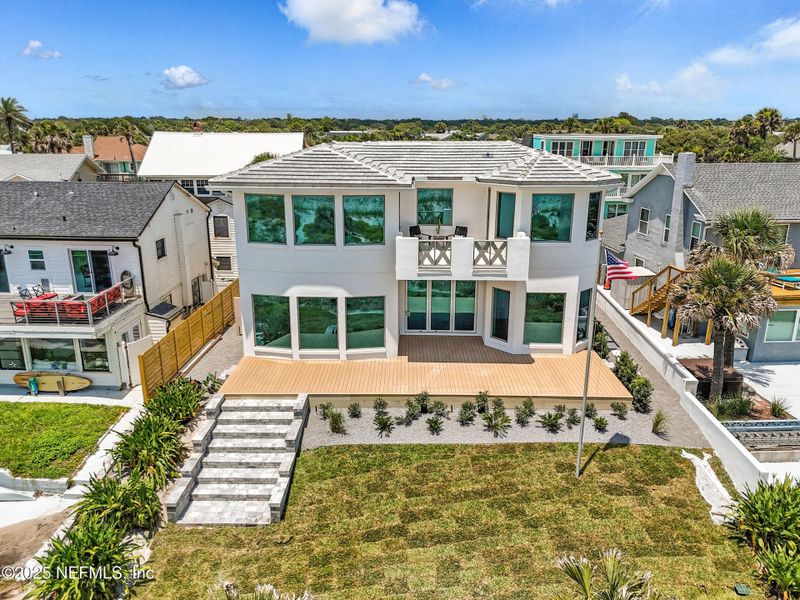 Front exterior of a new home in , Neptune Beach, FL, highlighting curb appeal (Image 1).