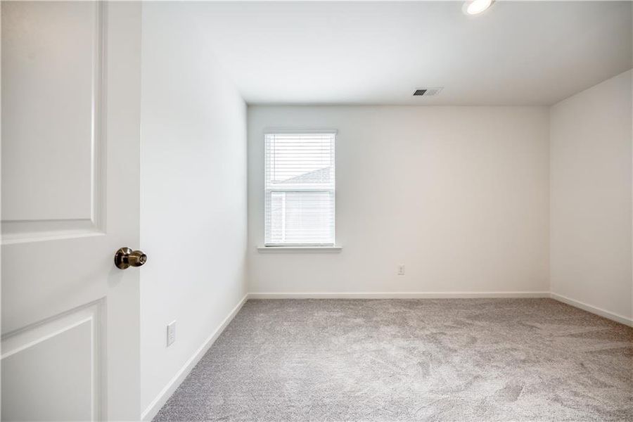 Spacious, unfurnished interior of a new home in Watson Farms, Loganville (Image 13). Spacious, unfurnished interior of a new home in Watson Farms, Loganville (Image 13).