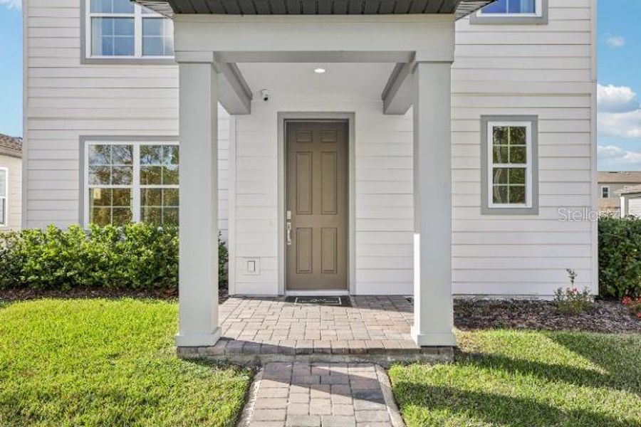 Exterior details and patio area of a home in Northlake Classical, Winter Garden (Image 3). Exterior details and patio area of a home in Northlake Classical, Winter Garden (Image 3).