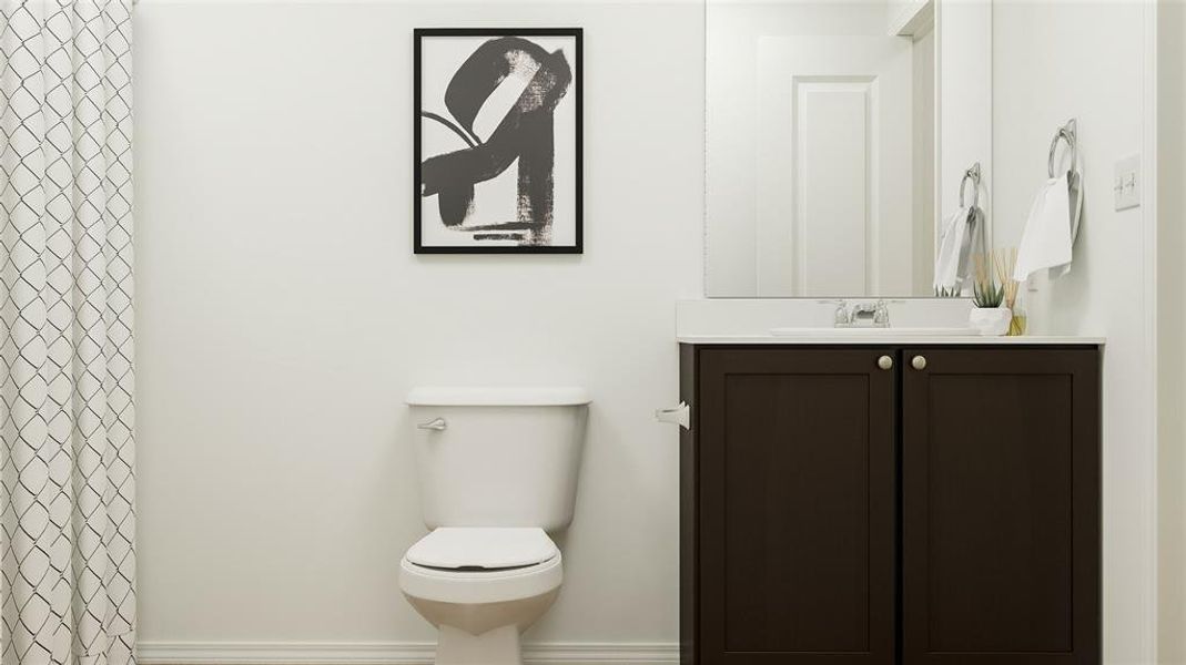 Bathroom with vanity and toilet