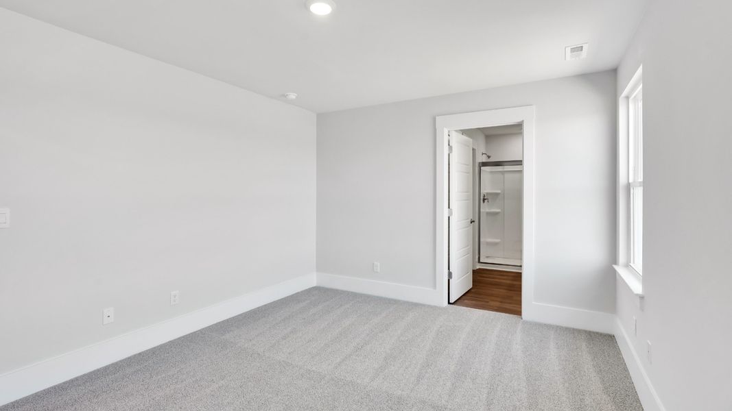 Spacious, unfurnished interior of a new home in The Pines at Blake Farm, Wilmington (Image 22).