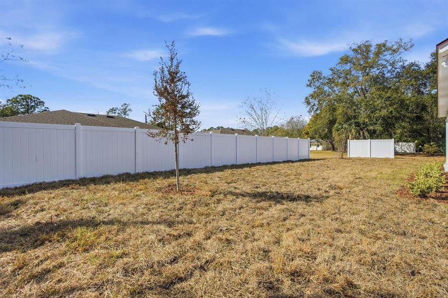 Exterior details and patio area of a home in Palm Coast Homes, Palm Coast (Image 20).