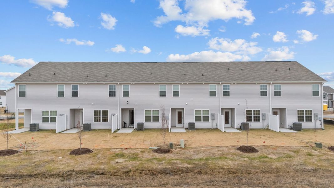 Exterior details and patio area of a home in The Townes at Ridgewood Farms, Winterville (Image 21). Exterior details and patio area of a home in The Townes at Ridgewood Farms, Winterville (Image 21).