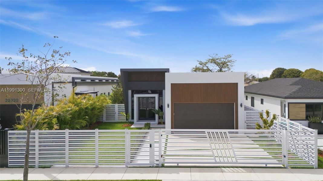Front exterior of a new home in , Miami, FL, highlighting curb appeal (Image 22).