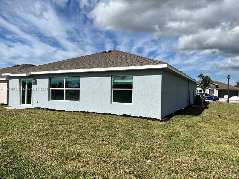 Exterior details and patio area of a home in , Lehigh Acres (Image 3).