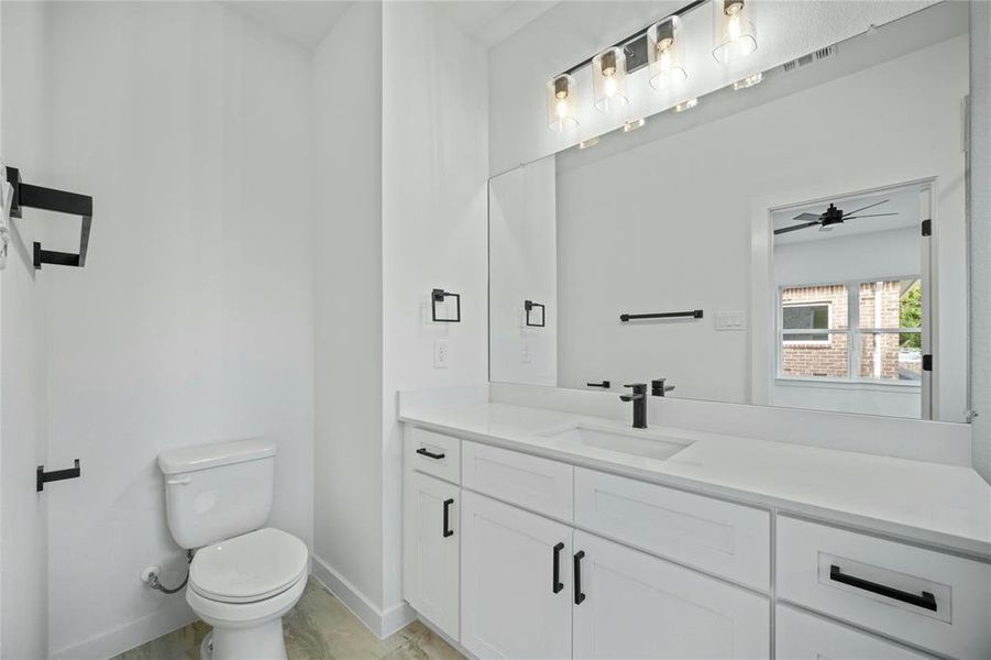 Bathroom with vanity and ceiling fan Bathroom with vanity and ceiling fan